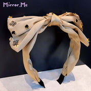 【動画あり】サテン生地クロスデザインビジュー付きビッグリボンカチューシャ　３色展開 - select store mirror me【動画あり】サテン生地クロスデザインビジュー付きビッグリボンカチューシャ　３色展開98464031mirror meselect store mirror me98464031オフホワイト