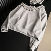 オフショルダーフリルスウェット
