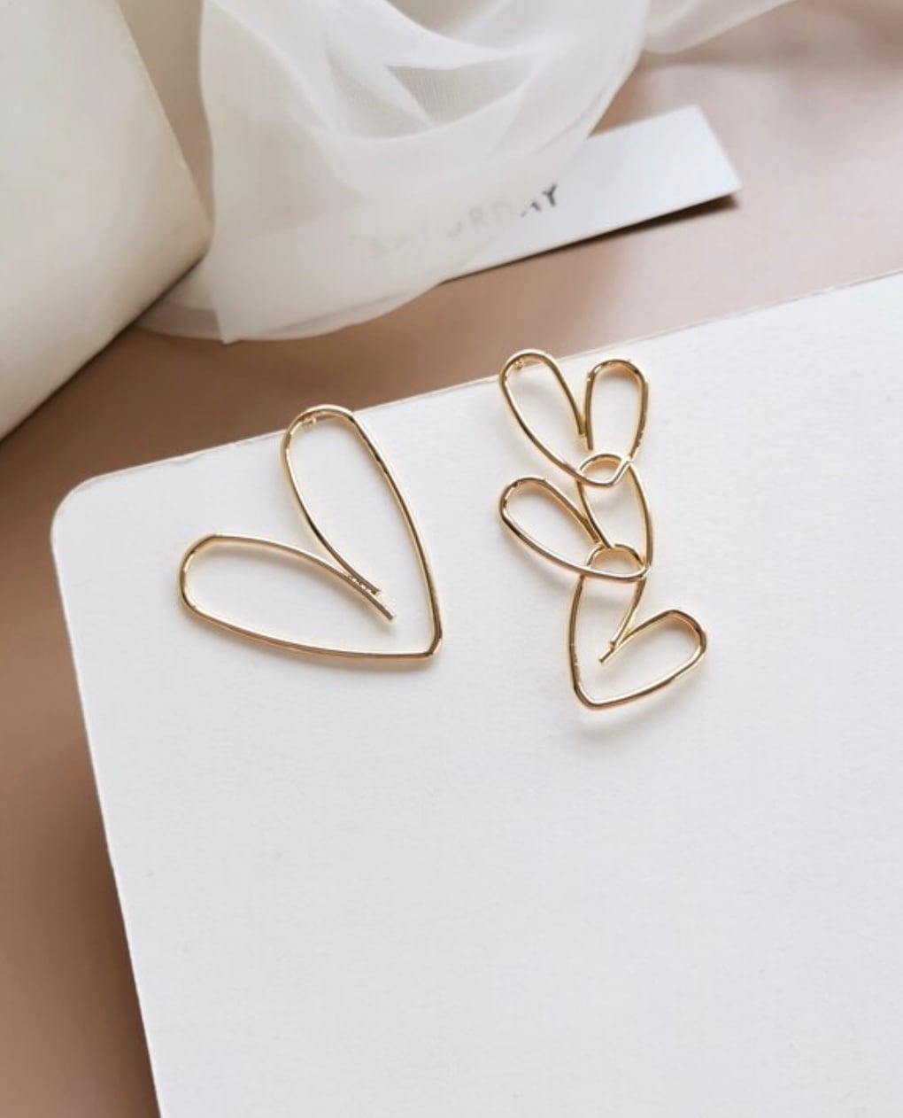 アシンメトリーニュアンスハートピアス - select store mirror meアシンメトリーニュアンスハートピアスmirror meselect store mirror meフリーサイズ